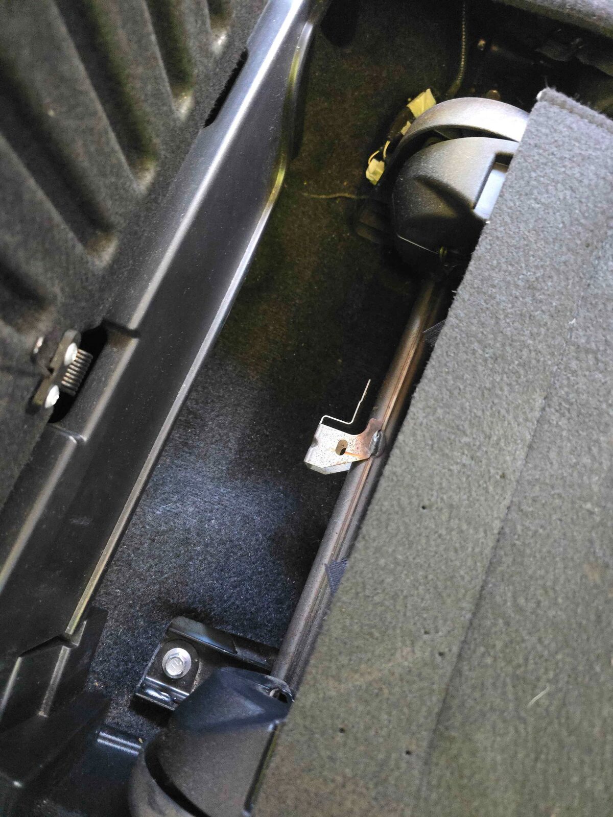 Under car seat after cleaning — thoroughly cleared