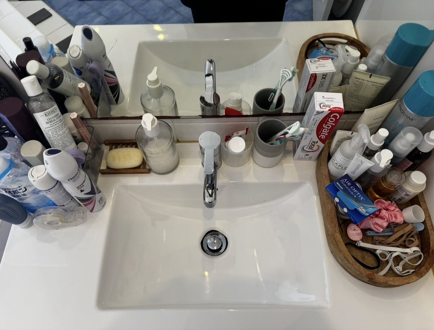 Vanity after deep clean — basin bright, chrome polished